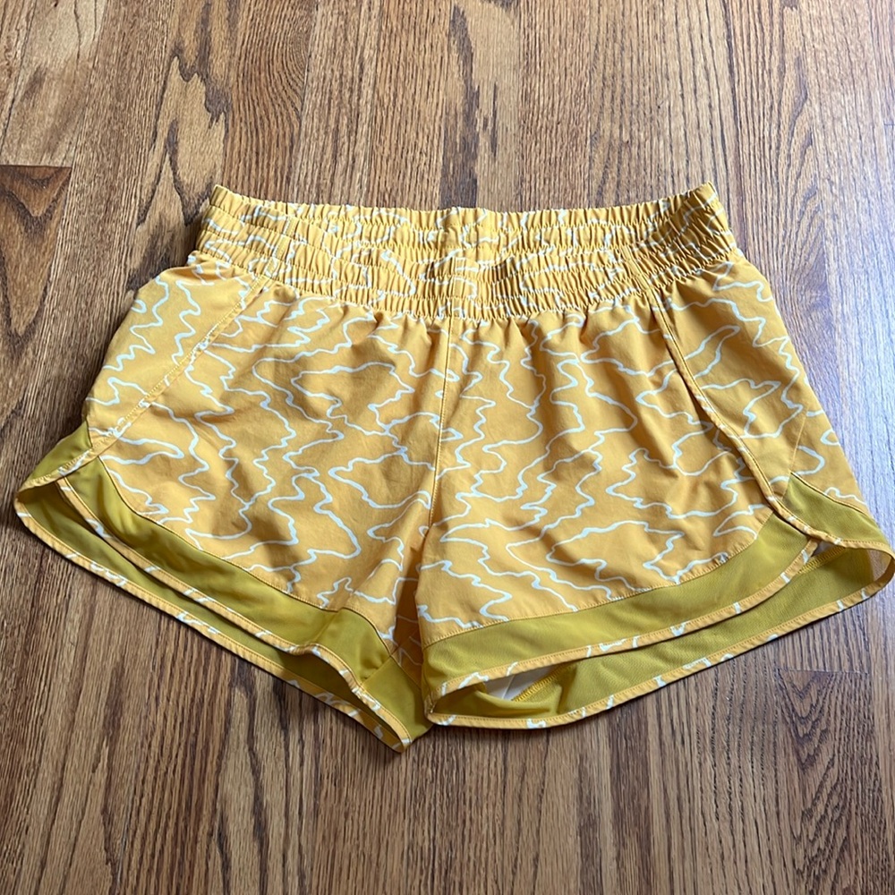ATHLETA Printed Mesh Racer Run Short 4 inch lined running athletic short pocket